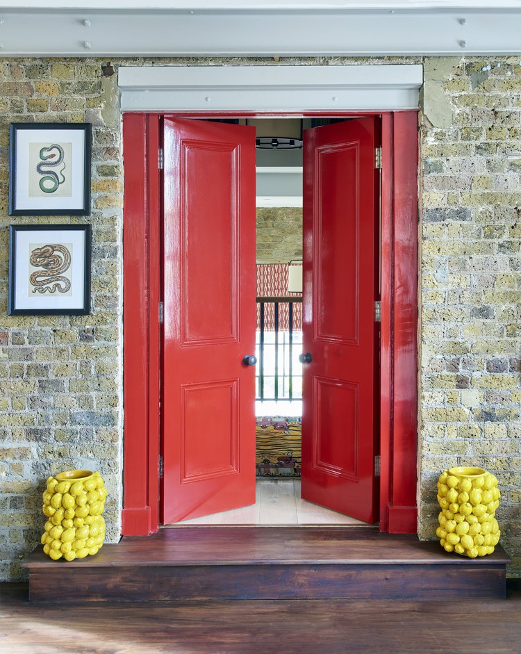 Red doorway by Howark Design