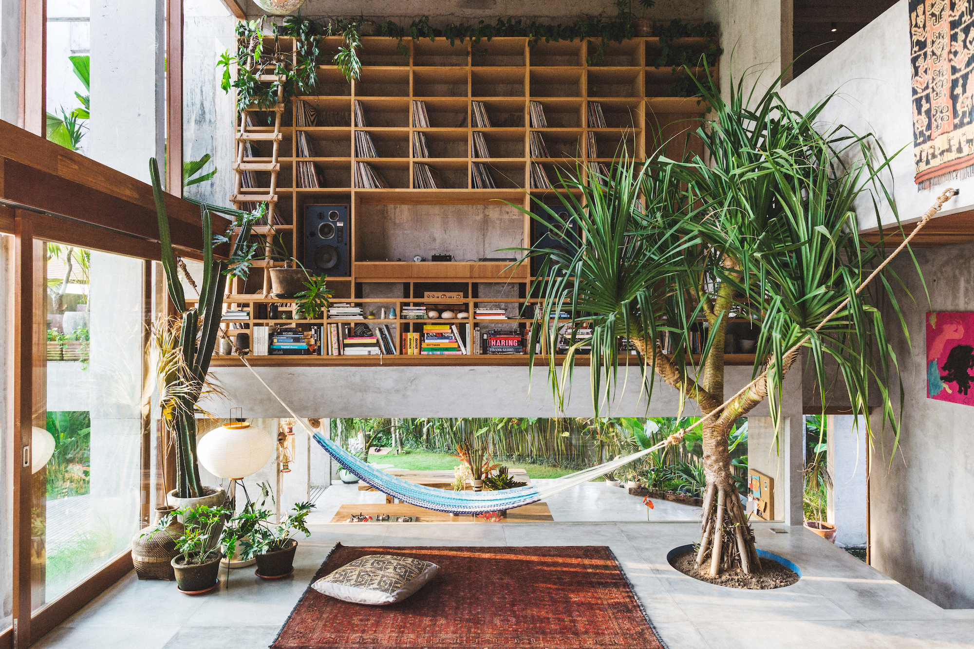Music storage and split-level living space in the Padang Linjong residence in Bali, Indonesia, created by designer Daniel Mitchell and architect Patisandhika Sidarta - Effect Magazine