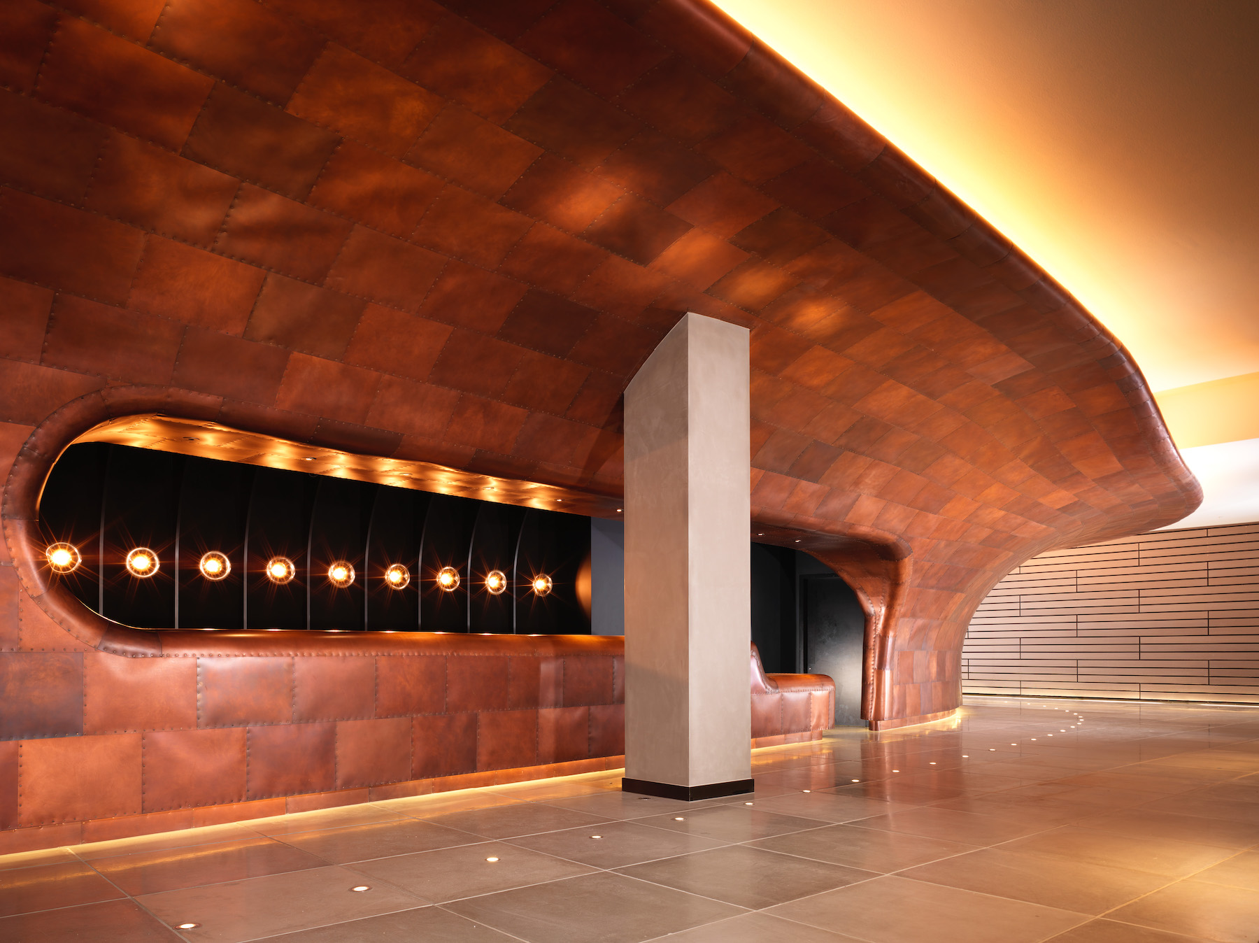 A sculptural copper hull at Sea Containers by hotel designer Jacu Strauss in Effect Magazine