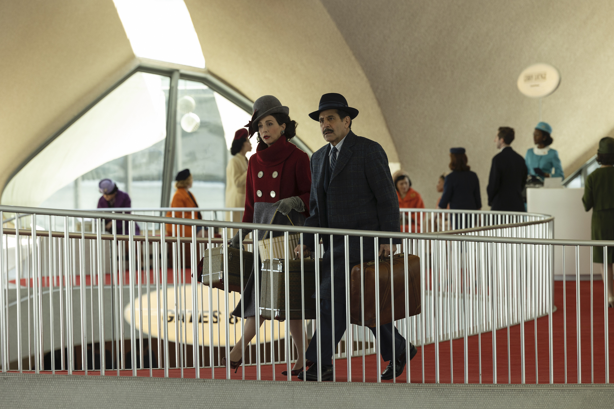 Marin Hiinkle as Rose Weissman and Tony Shalhoub as Abe Weissman at the Eero Saarinen-designed 1960s TWA terminal at JFK Airport in The Marvelous Mrs. Maisel - Effect Magazine