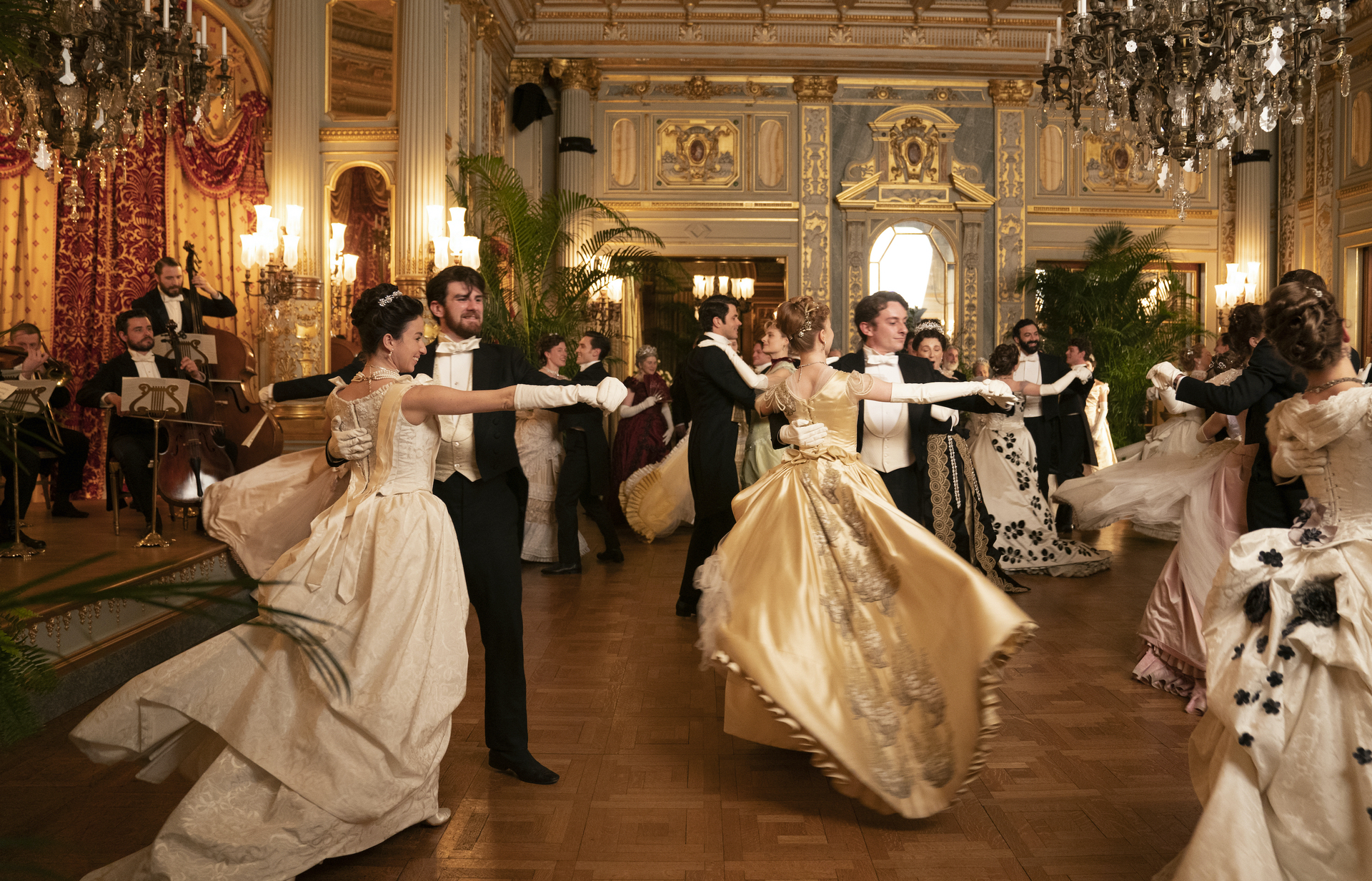 Ballroom scene in The Gilded Age on HBO, shot at The Breakers – a Renaissance-style mansion built by Cornelius Vanderbilt II and designed by architect Richard Morris Hunt  - Effect Magazine
