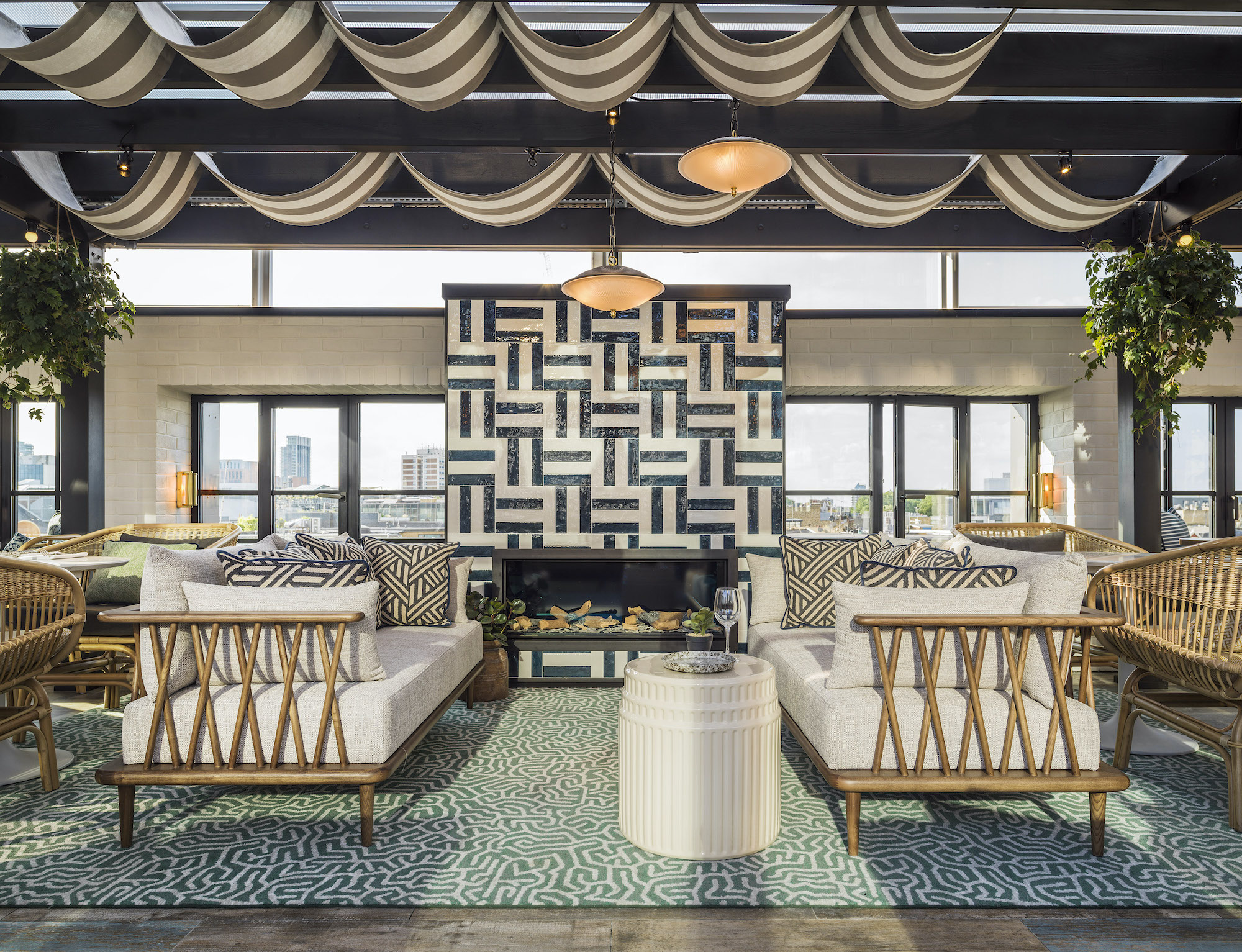 Geometric patterns and bentwood furniture lend 1950s glamour to the Mondrian hotel in Shoreditch, London, interior designed by Goddard LIttlefair