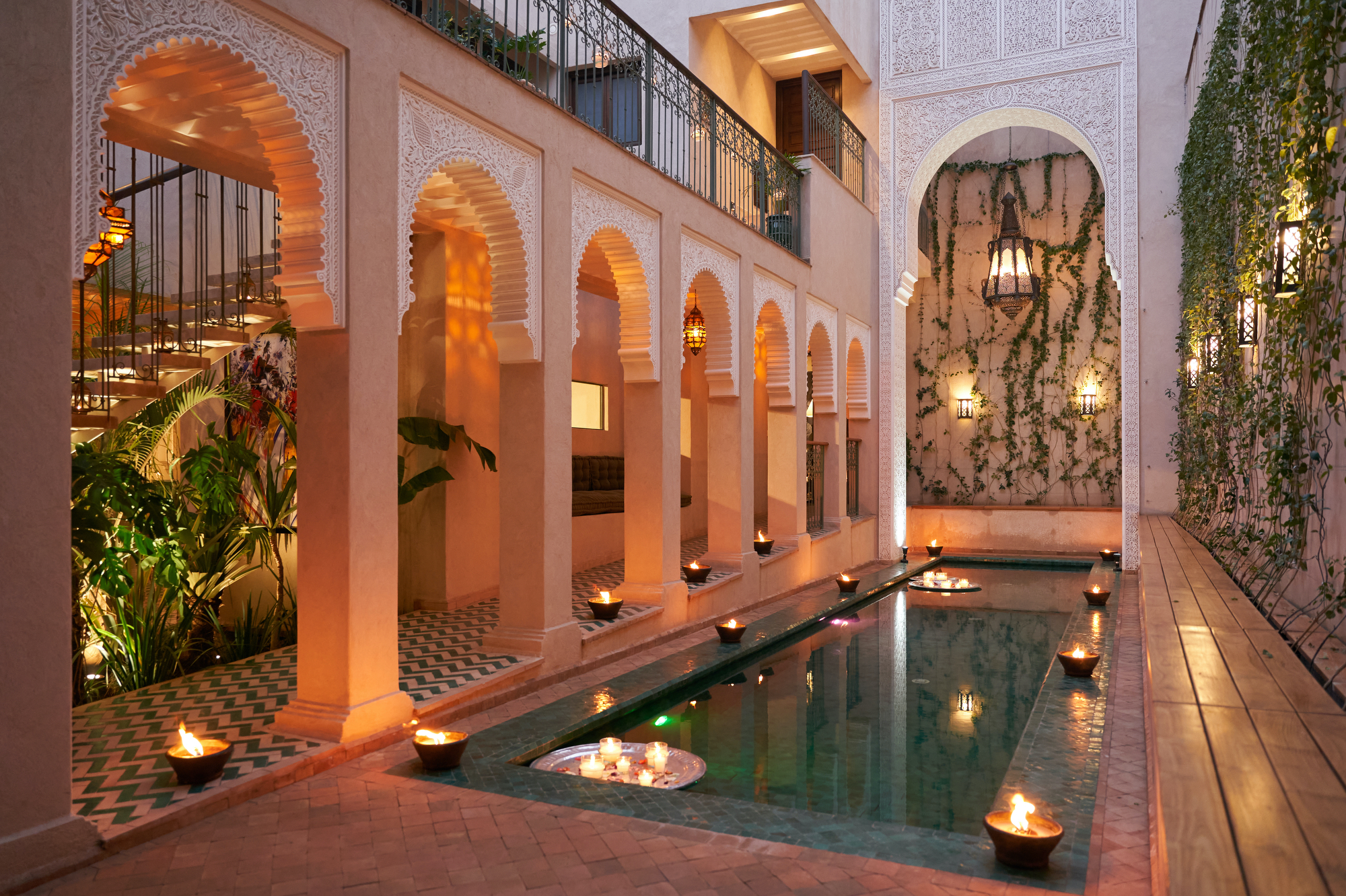Courtyard pool at night at Izza hotel in Marrakesh - Effect Magazine